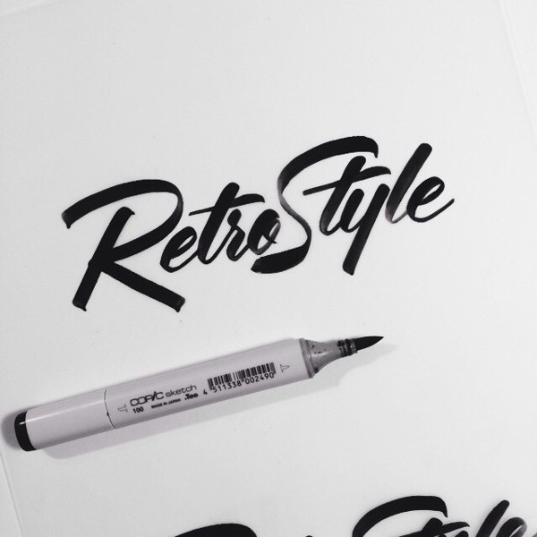 Neil Secretario brush script lettering