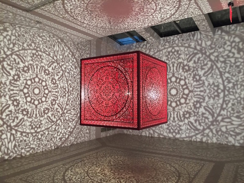 floating cube by anila quayyum agha casts incredible shadows