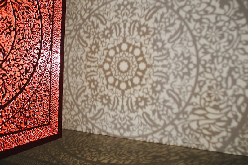 floating cube by anila quayyum agha casts incredible shadows