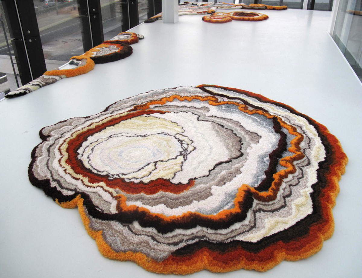 decaying rugs by lizan freijsen