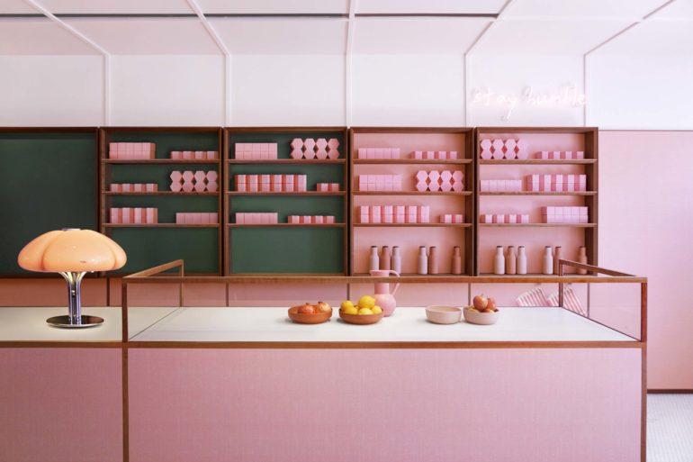 A pink Formica cafe by Child Studio