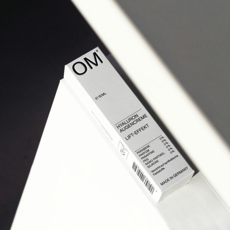 OM visual identity exudes restraint