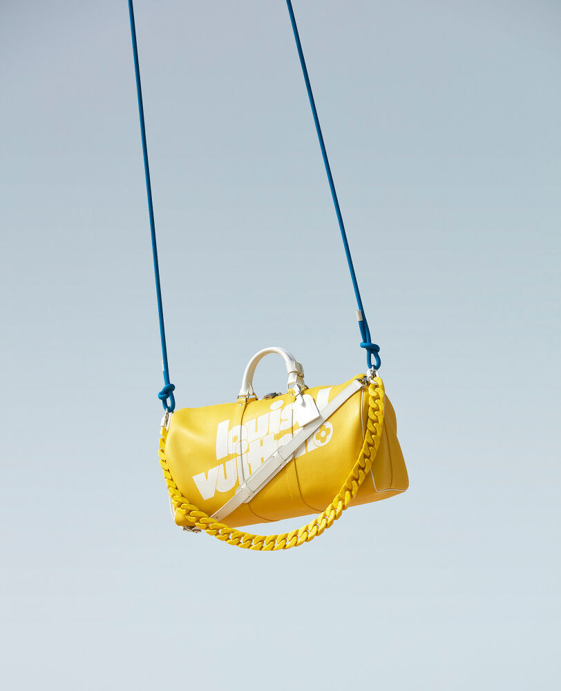 Seoul - 06.15.2021: yellow Louis Vuitton bag on showcase in store. Stock  Photo
