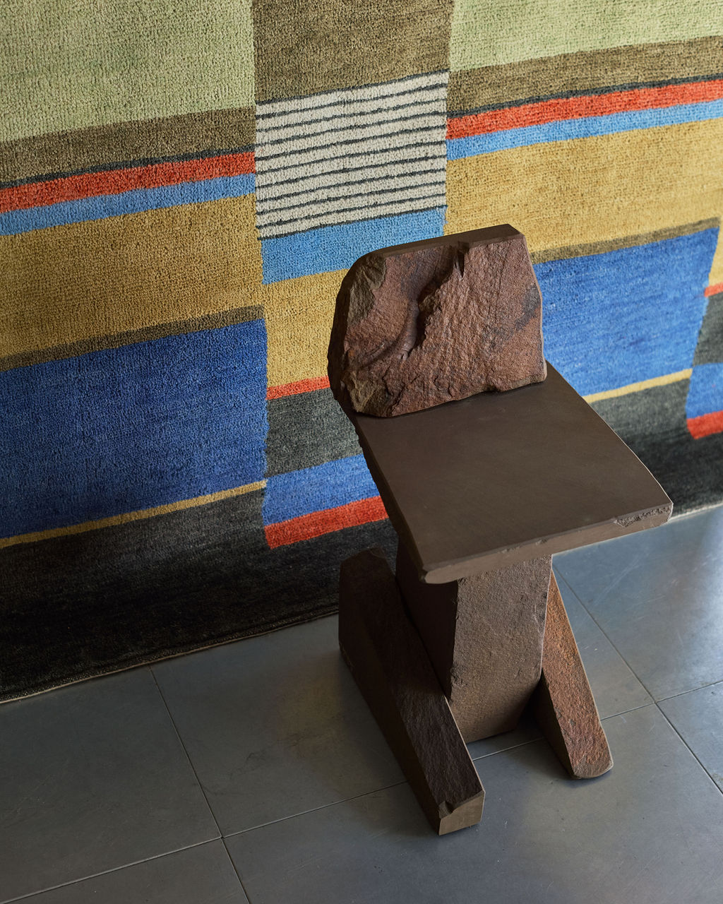 ‘Graywacke OffCut Chair’ (2024) by Carsten in der Elst with ‘Plate 111’ by Gunta Stölzl, from Christopher Farr
